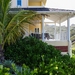 Unit is set within a tropical garden